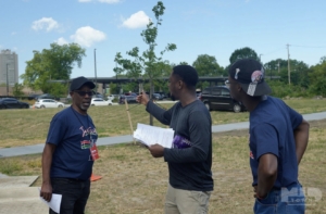 Pictured above is Keith Benford Sr., DaQuavion Roston, and Keith Benford Jr. 